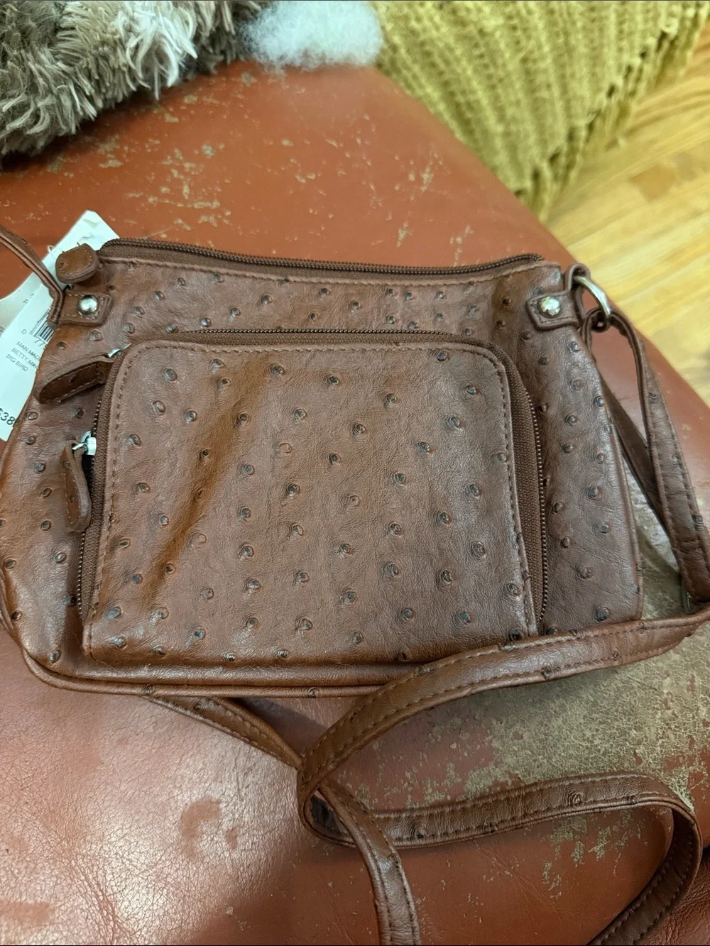 Mundi Brown Textured Crossbody with Buckle Accent